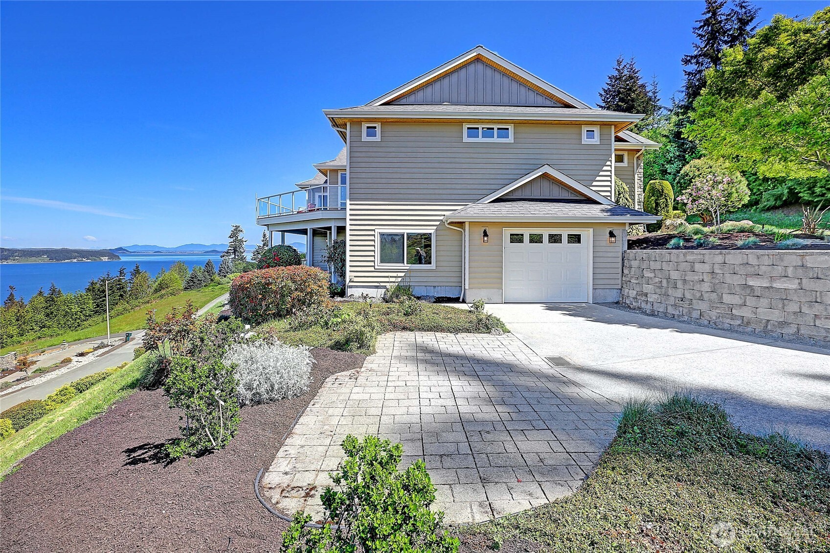 1081 Morgan Way Camano Island, WA 98282 - Photo 7 of 39 a front view of a house with a yard
