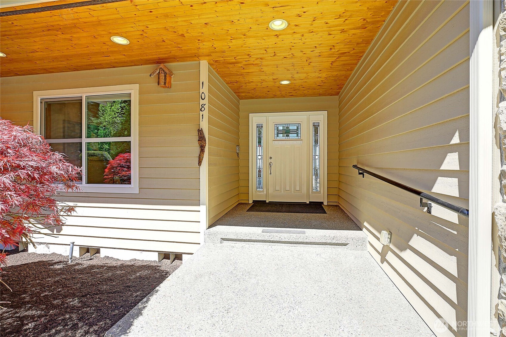 1081 Morgan Way Camano Island, WA 98282 - Photo 8 of 39 a view of a house with a door and a window