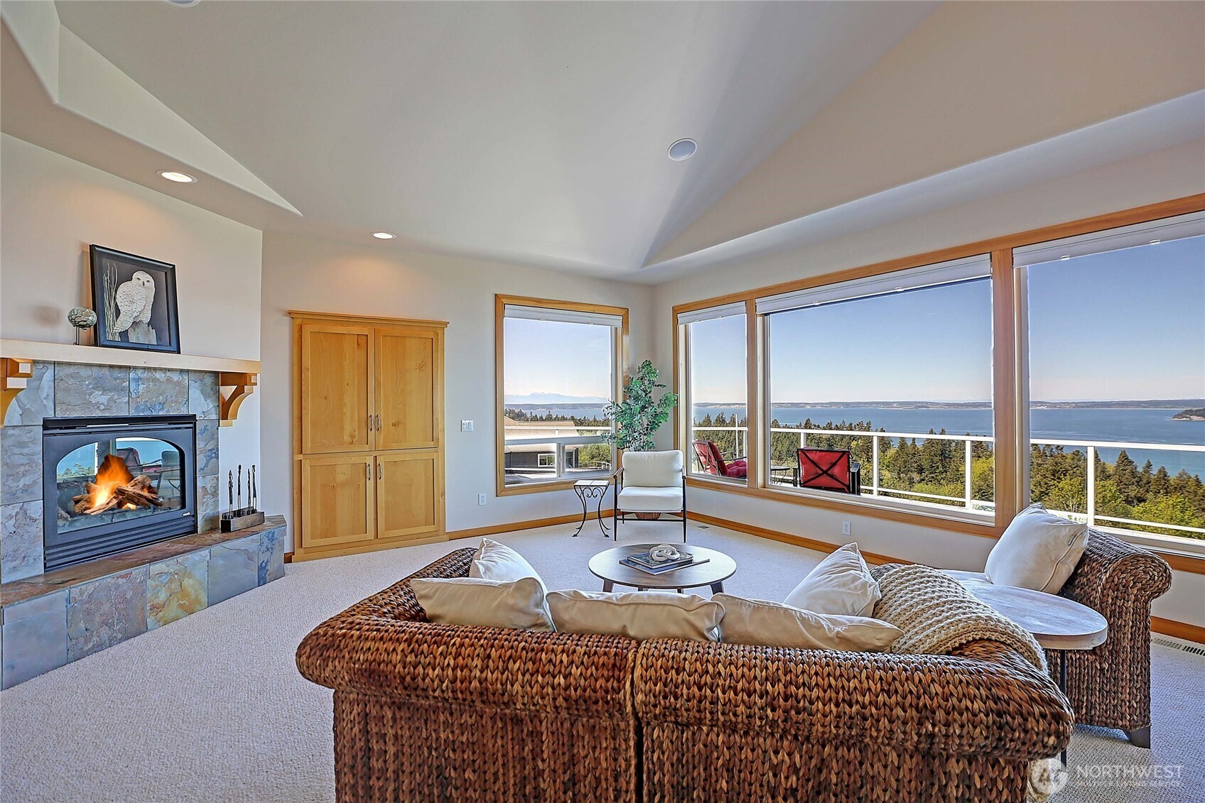 1081 Morgan Way Camano Island, WA 98282 - Photo 10 of 39 a living room with furniture and a fireplace