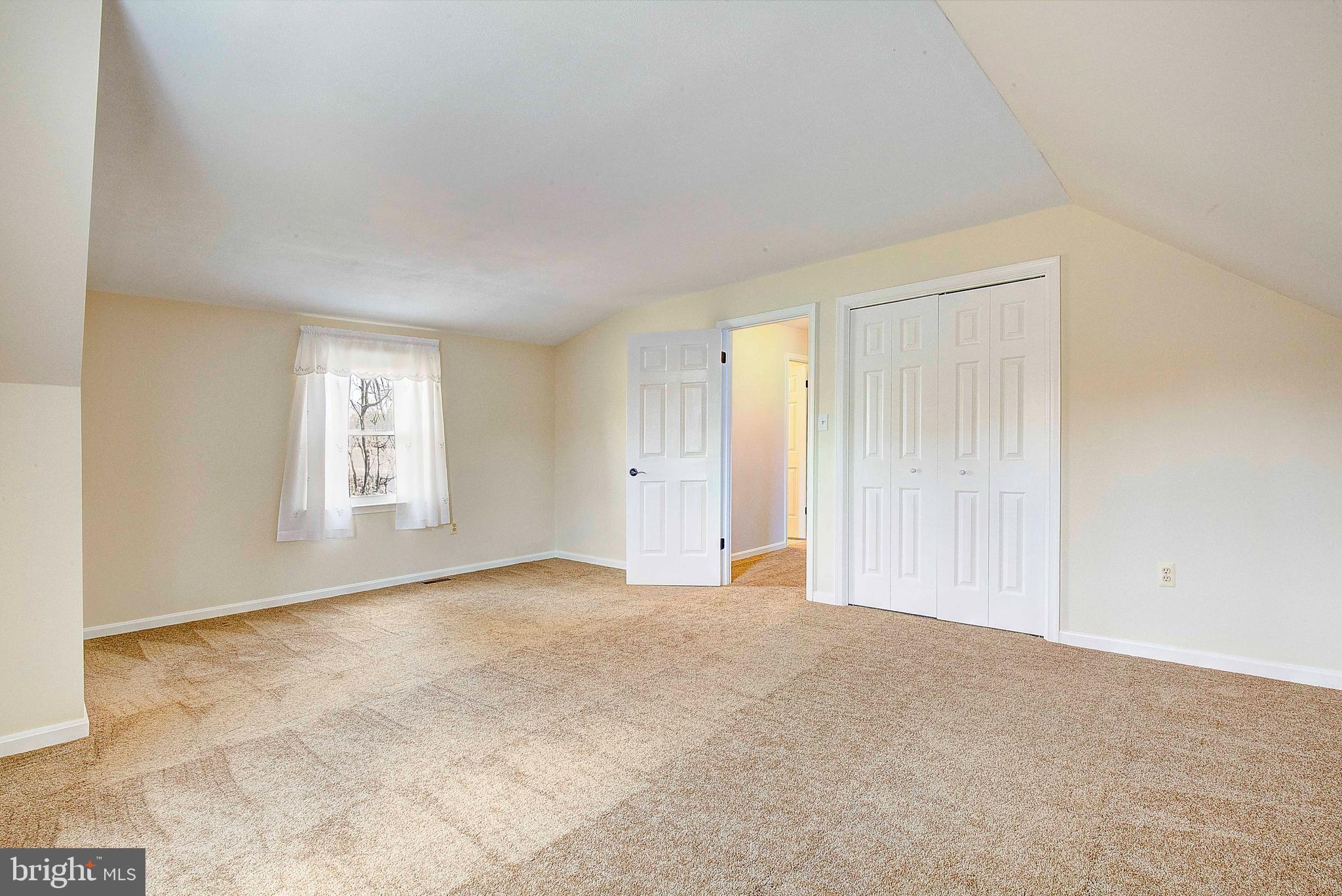 9150 Mackall Road St. Leonard, MD 20685 - Photo 26 of 48 a view of an empty room with a window