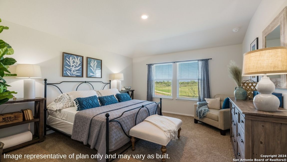 14671 Clay Rdg Run San Antonio, TX 78253 - Photo 13 of 42 a bedroom with bed couch and window