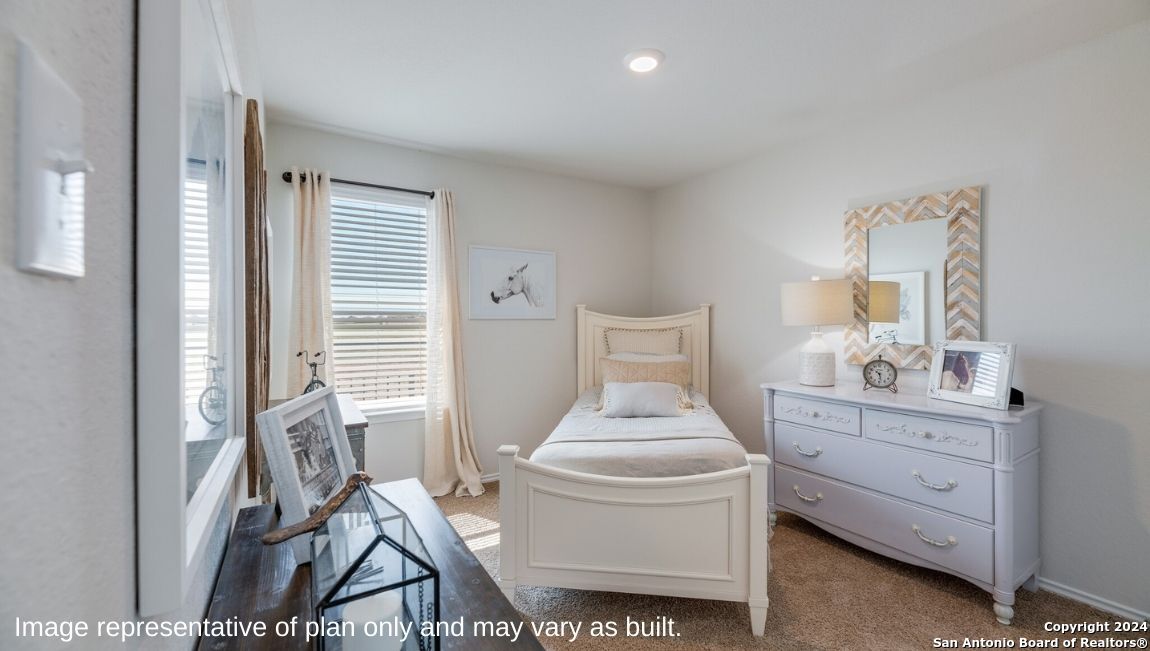 14671 Clay Rdg Run San Antonio, TX 78253 - Photo 17 of 42 a room with a chair and white walls