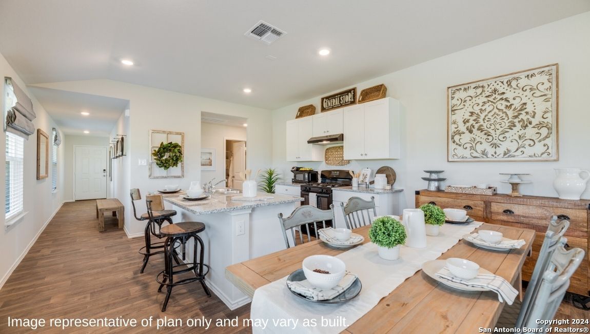 14671 Clay Rdg Run San Antonio, TX 78253 - Photo 8 of 42 a living room with furniture kitchen and a table