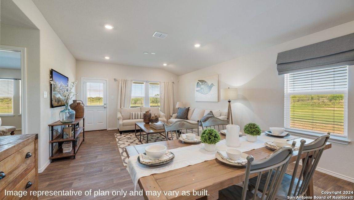 14671 Clay Rdg Run San Antonio, TX 78253 - Photo 9 of 42 a view of a dining room with furniture