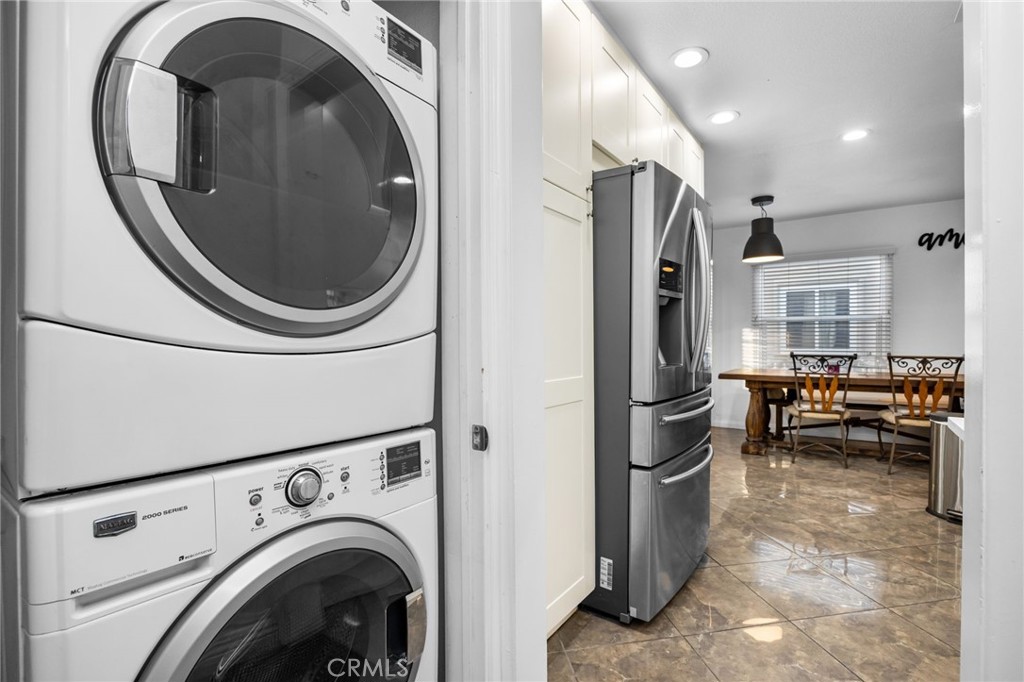 1231 South Baker Street Santa Ana, CA 92707 - Photo 27 of 48 a view of kitchen with washer and dryer