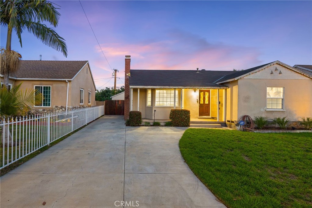 1231 South Baker Street Santa Ana, CA 92707 - Photo 3 of 48 a house view with a garden space