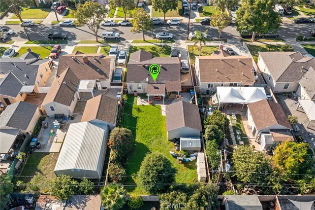 an aerial view of residential house with outdoor space