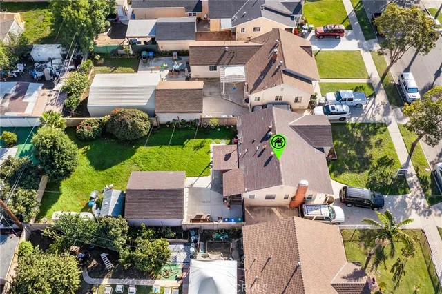 an aerial view of a swimming pool with outdoor space