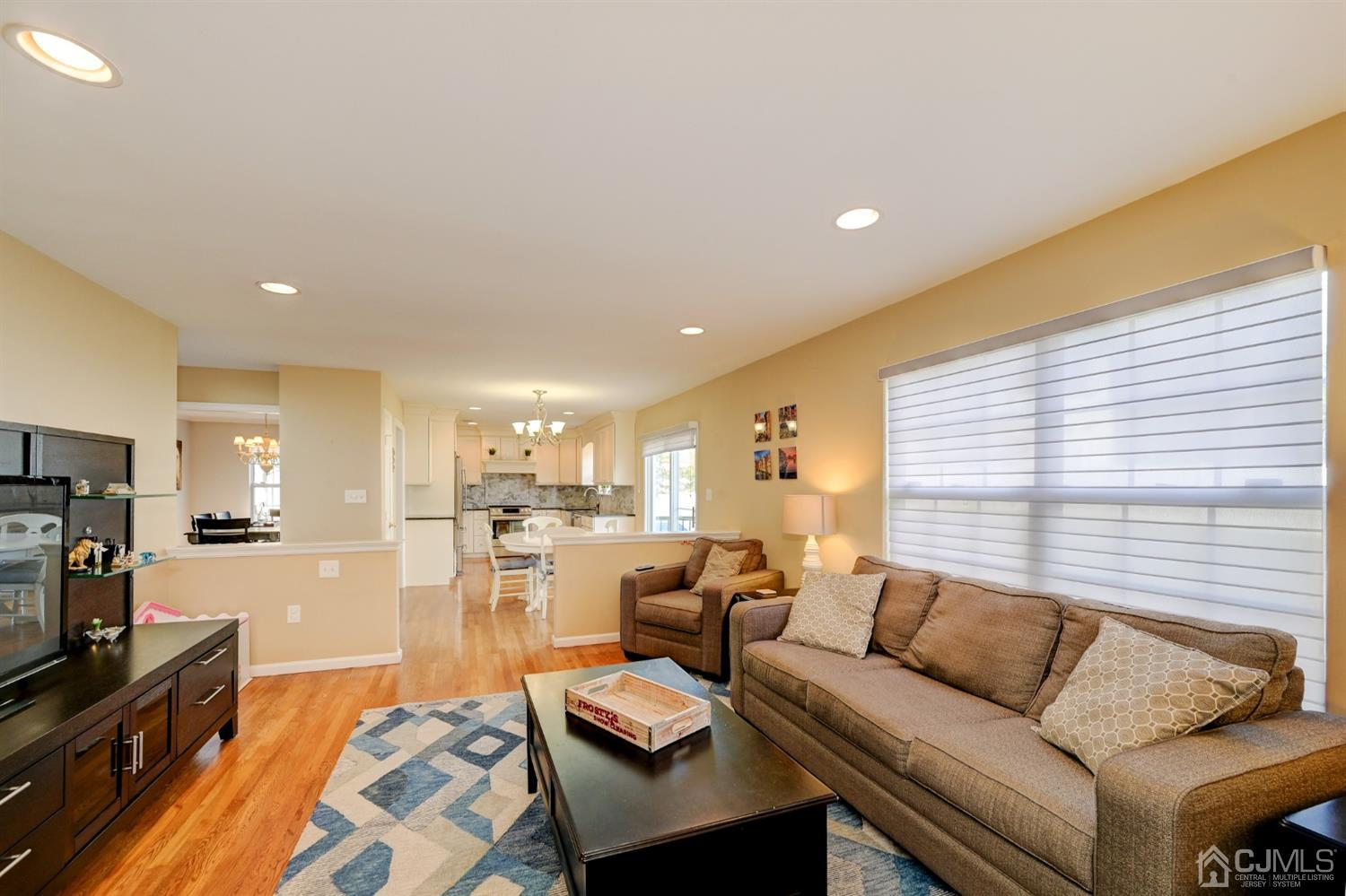 67 Gate Lane Old Bridge, NJ 08857 - Photo 15 of 39 a living room with furniture and a flat screen tv
