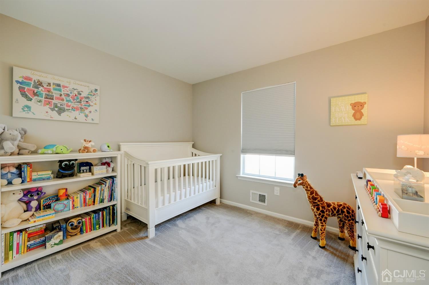 67 Gate Lane Old Bridge, NJ 08857 - Photo 19 of 39 a bedroom with furniture and a window