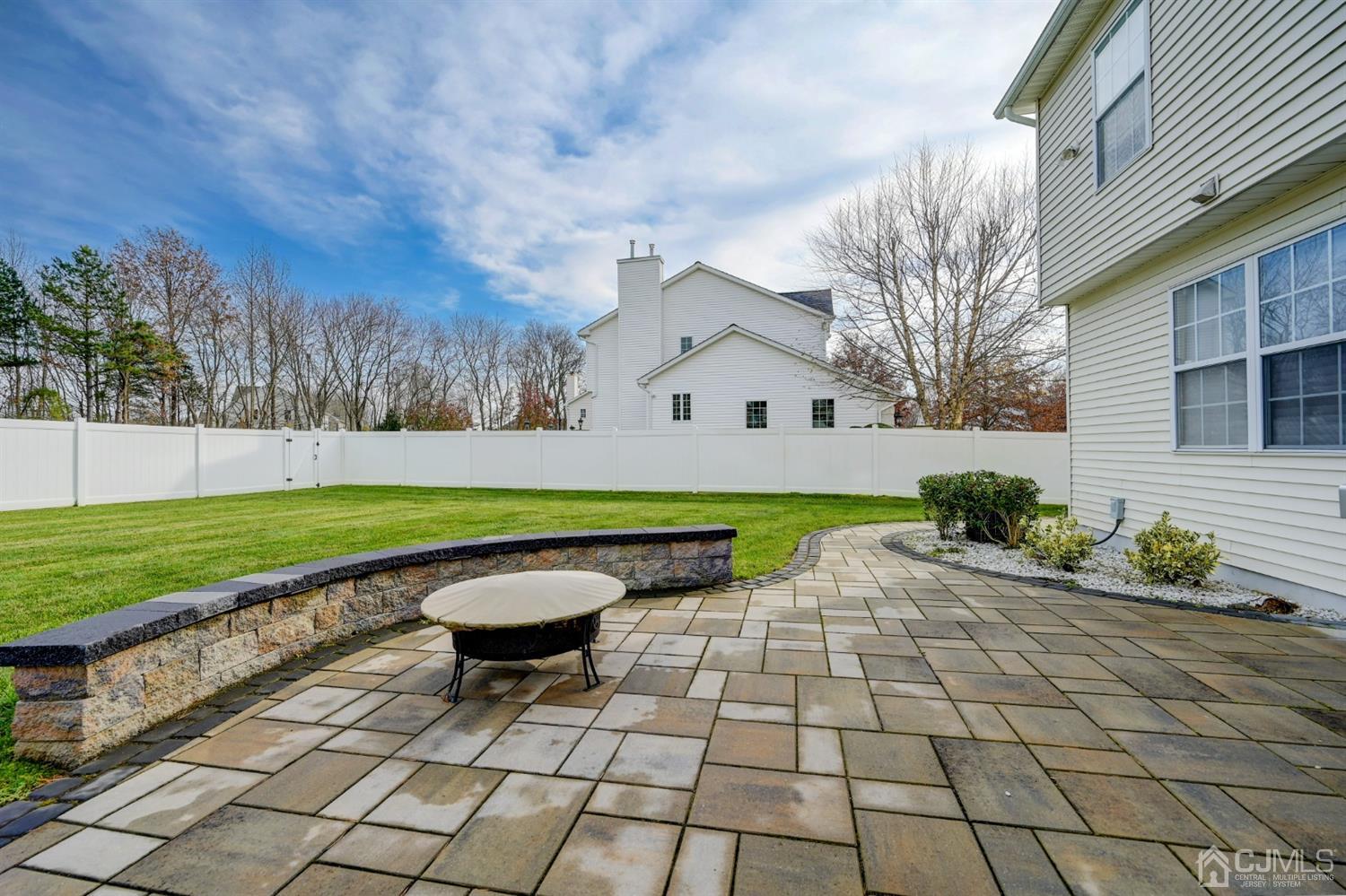 67 Gate Lane Old Bridge, NJ 08857 - Photo 31 of 39 a view of a bench in backyard of the house