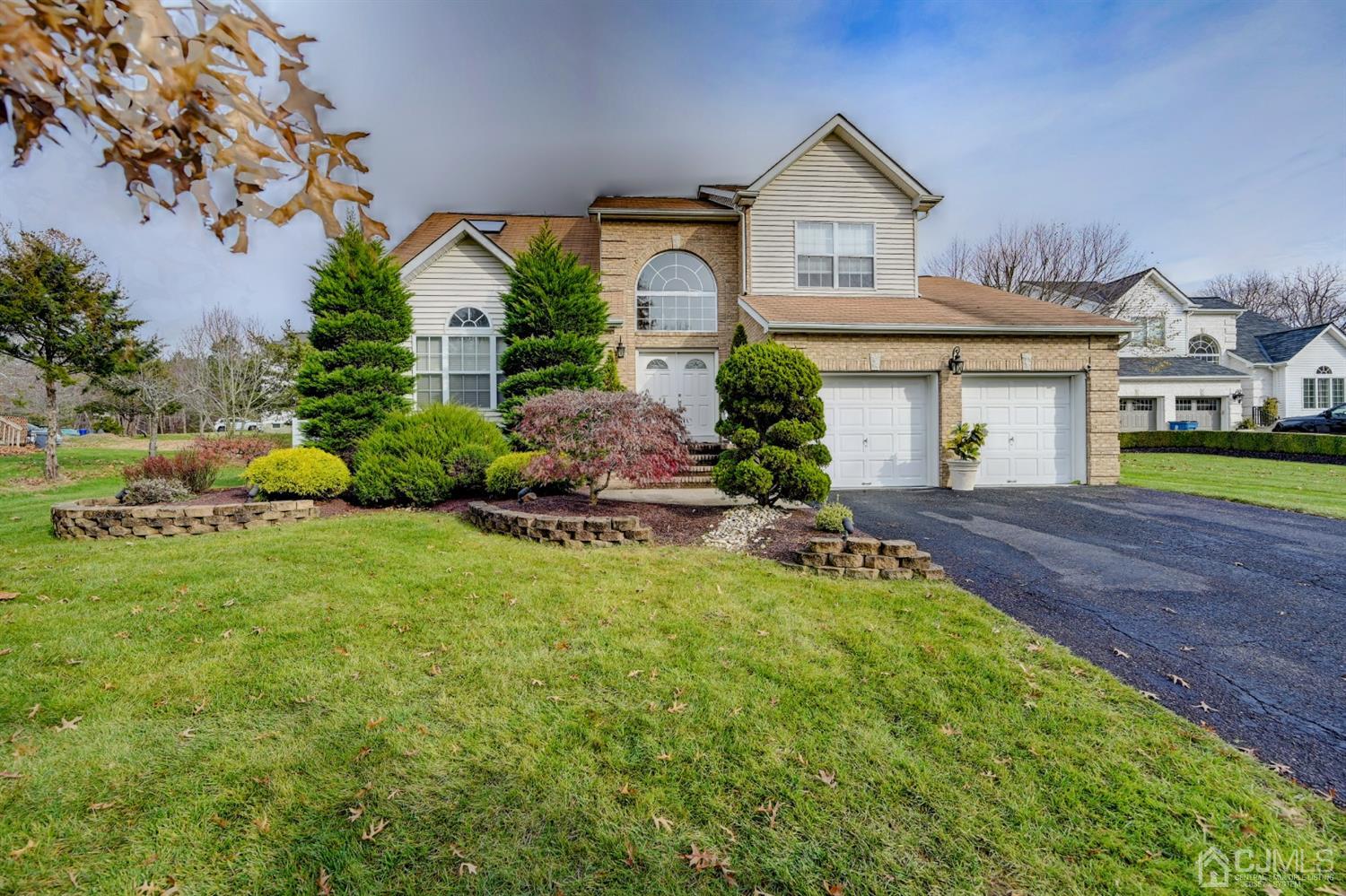 67 Gate Lane Old Bridge, NJ 08857 - Photo 39 of 39 a front view of a house with garden