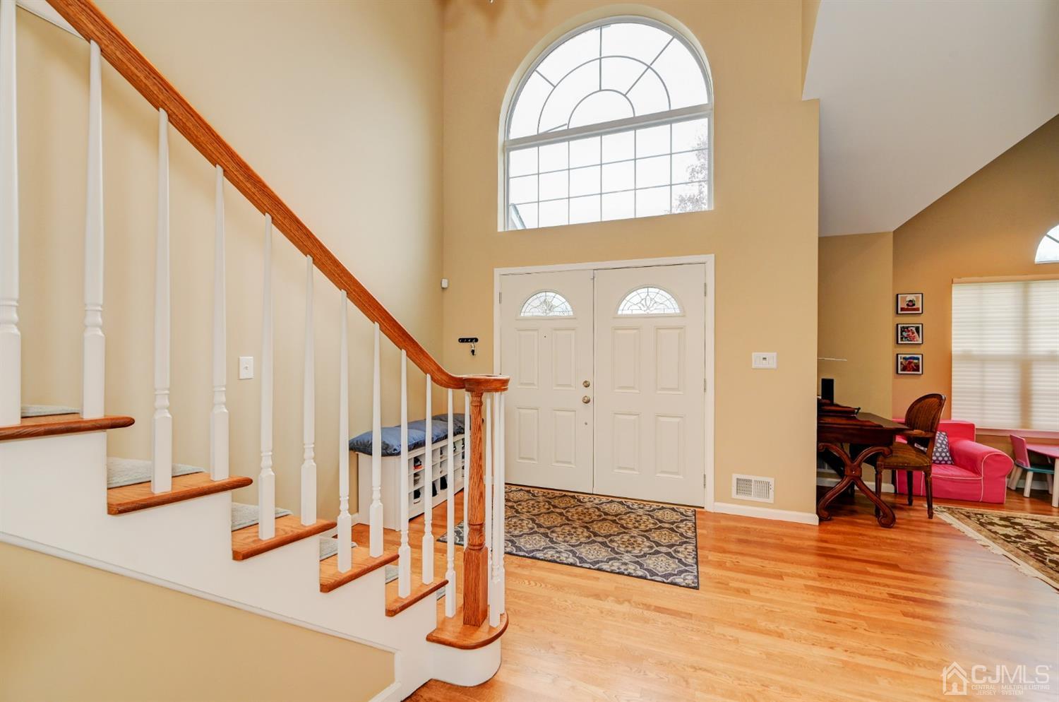 67 Gate Lane Old Bridge, NJ 08857 - Photo 5 of 39 a view of an entryway with wooden floor and door