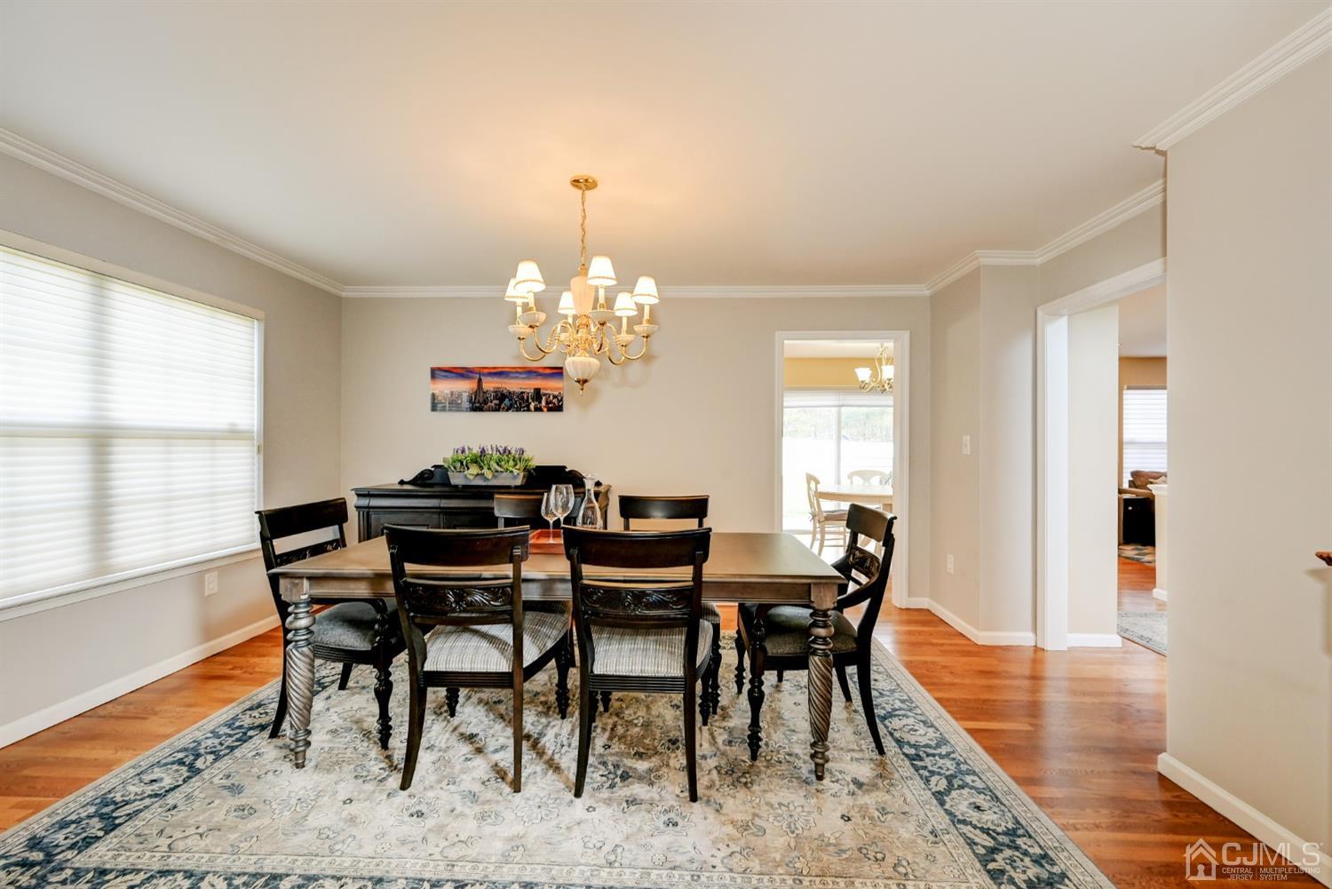 67 Gate Lane Old Bridge, NJ 08857 - Photo 8 of 39 a view of a dining room with furniture window and wooden floor
