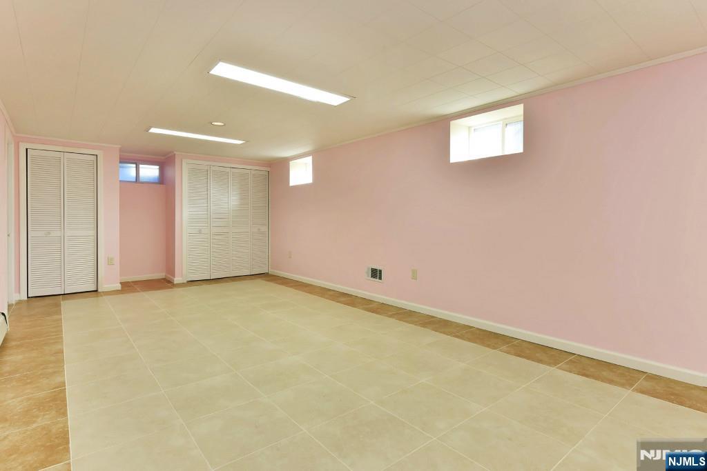 4 Marconi Street Tenafly, NJ 07670 - Photo 28 of 35 a view of an empty room with a window