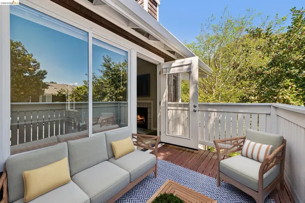 a view of a couches in the back yard of the house