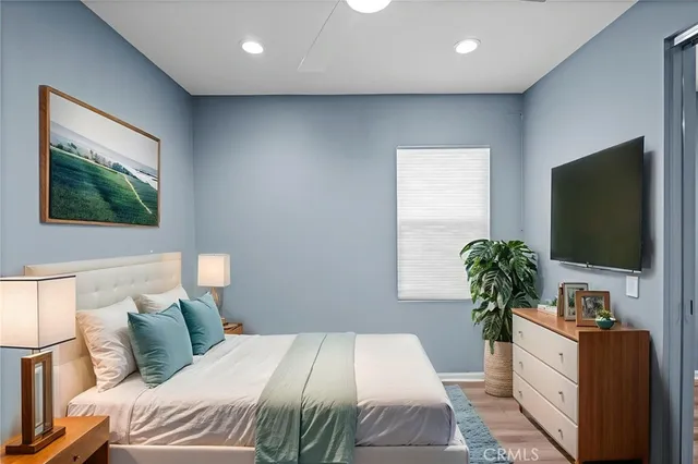 a view of a big room with wooden floor and closet