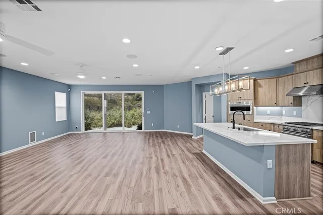 a view of kitchen and windows