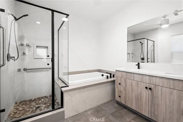 a view of a yard with wooden fence