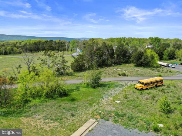 a view of a lake with a yard