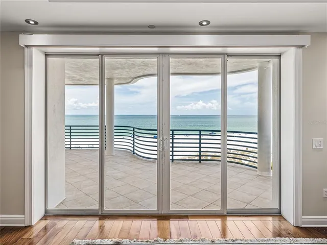 front view of a building with a garden