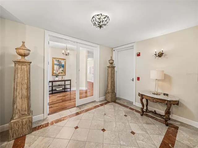 a kitchen with granite countertop a stove and a cabinet