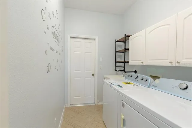 a utility room with a sink