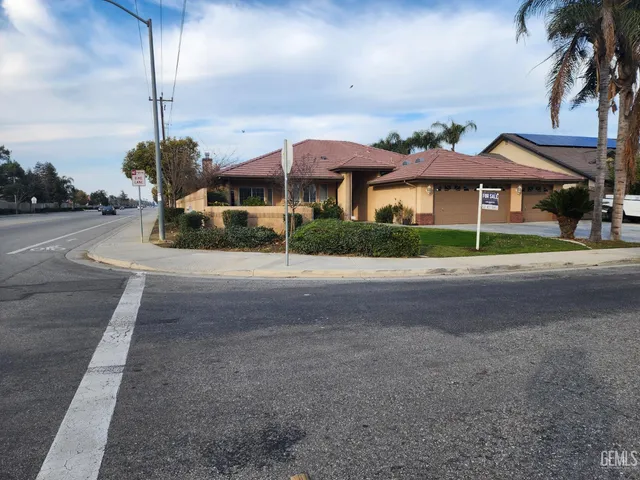 a house view with a garden space