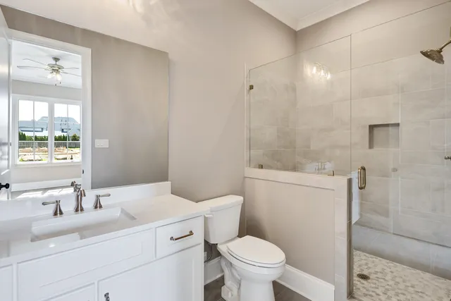 a kitchen with a sink cabinets and window