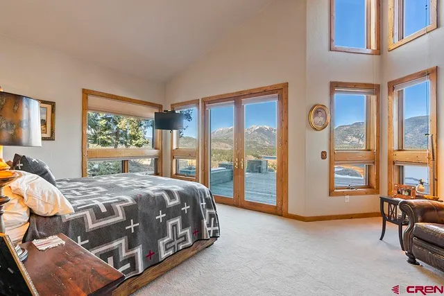 a view of a bathroom with a sink and shower