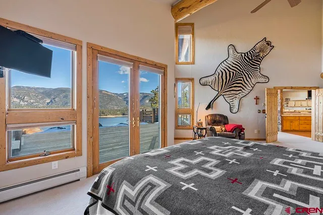 a bed room with furniture and a fireplace