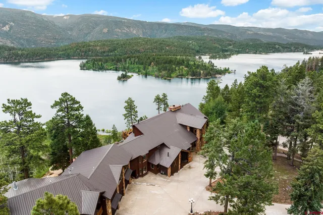 a view of a patio with chairs and a table