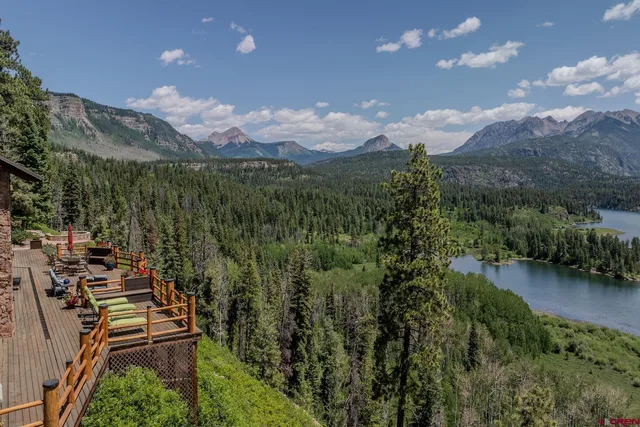 a view of swimming pool with outdoor seating