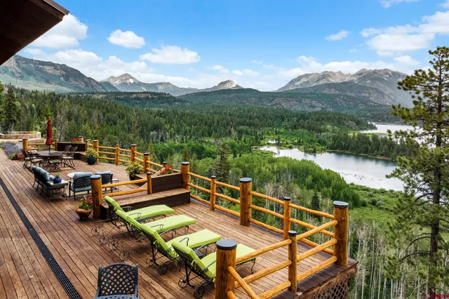 a view of a chairs and table in the terrace