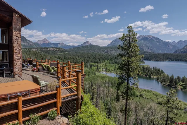 a view of a balcony with lake view