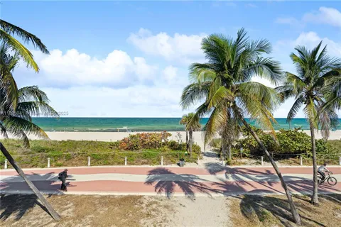 a view of swimming pool with a table and chairs