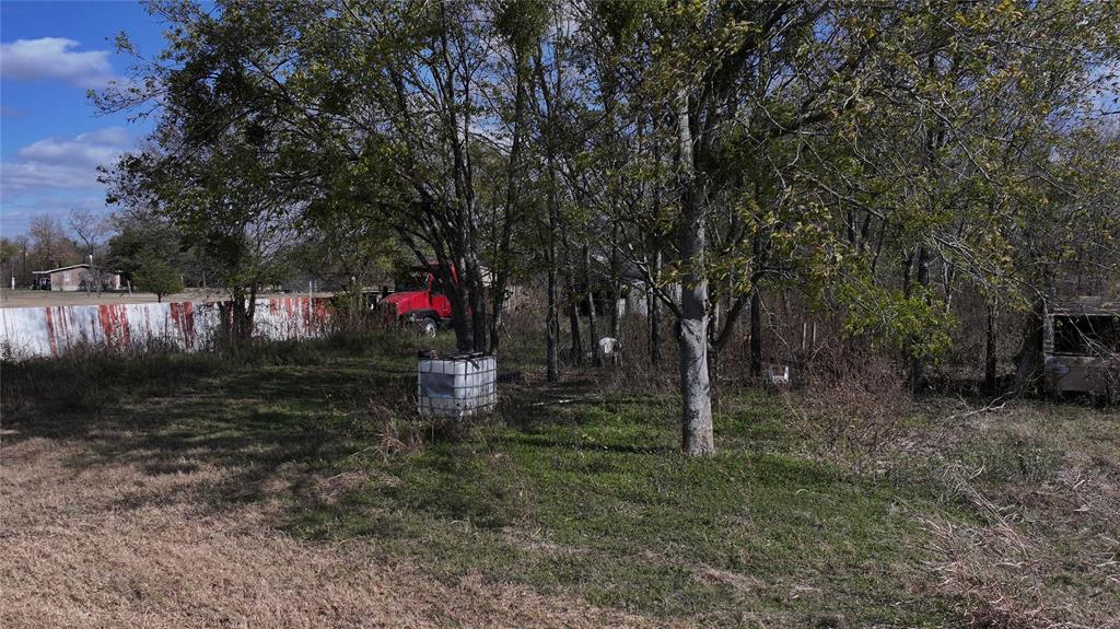 5601 Bilindsay Road Seagoville, TX 75159 - Photo 12 of 12 a backyard of a house with lots of green space