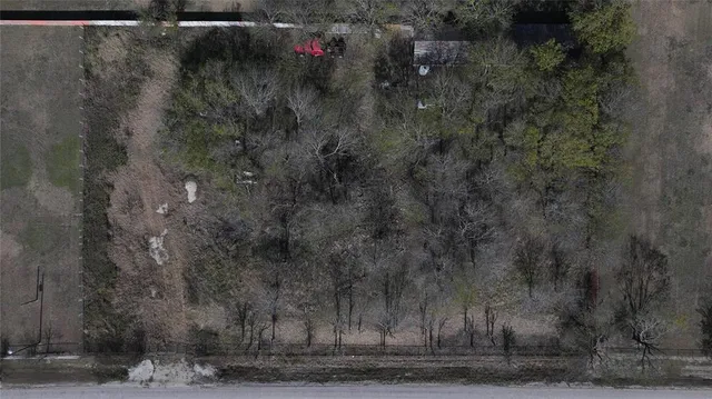 a view of a house next to a yard