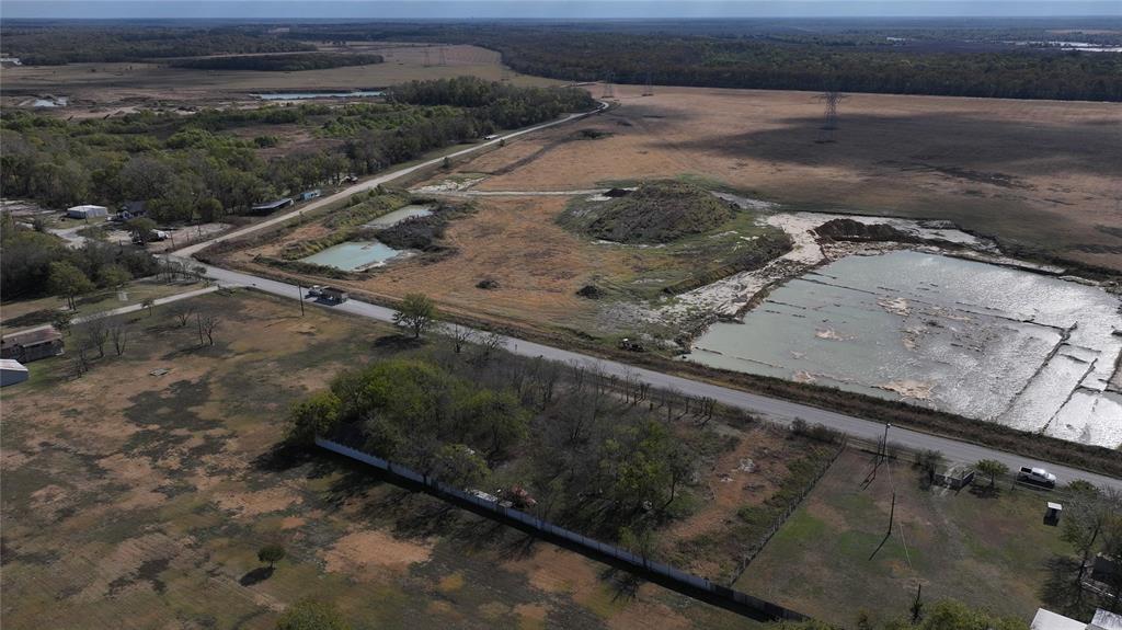 5601 Bilindsay Road Seagoville, TX 75159 - Photo 9 of 12 a view of a backyard with trees