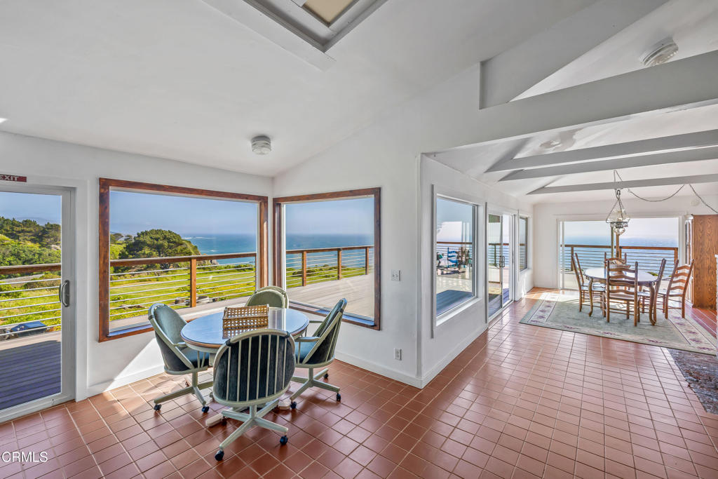 1990 Highway 1 Albion, CA 95410 - Photo 22 of 57 a view of a dining room with furniture water view and balcony