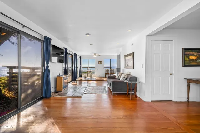 an aerial view of a house with a swimming pool