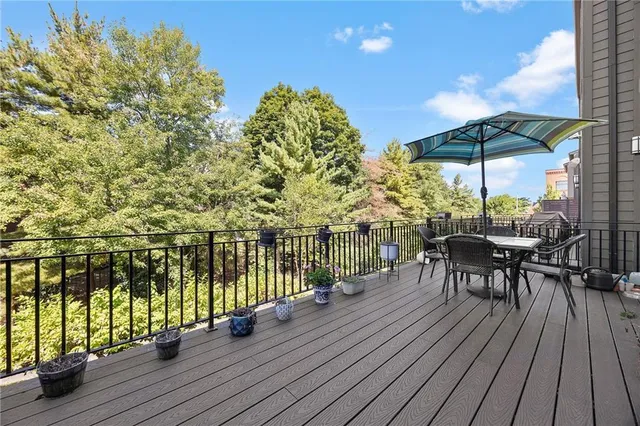 a view of a balcony with chairs