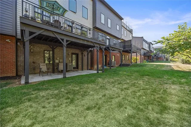 a view of a building with a yard