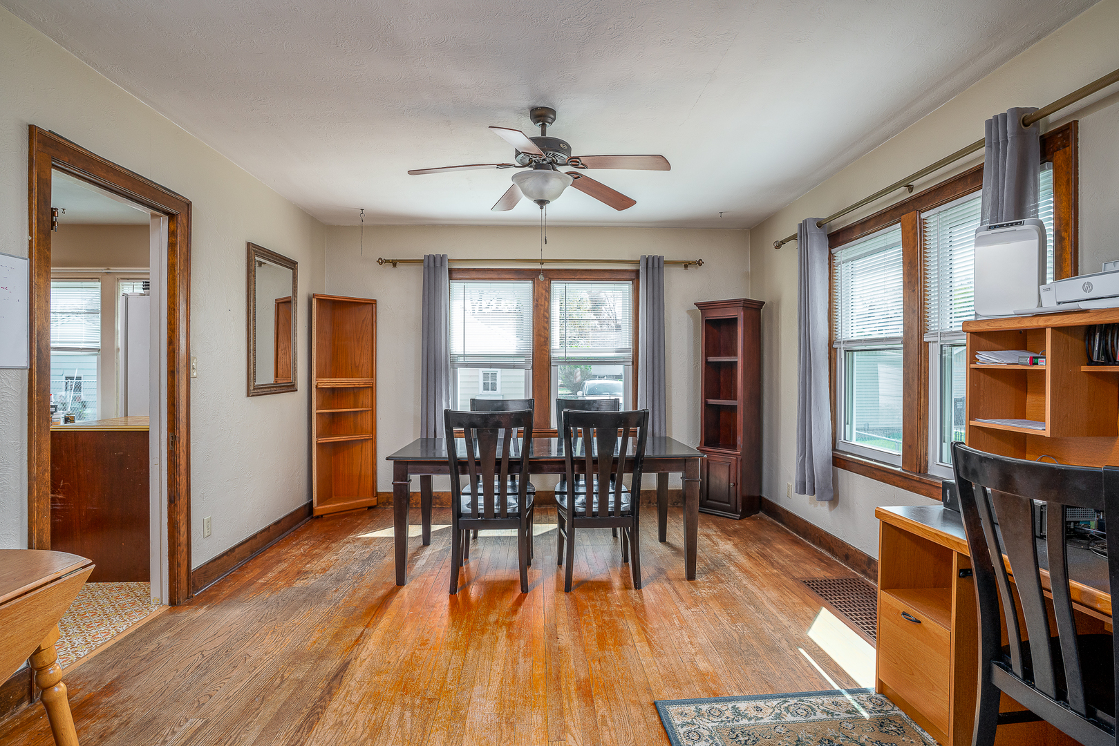 414 45th Street Moline, IL 61265 - Photo 6 of 13 a view of a dining room with furniture window and wooden floor