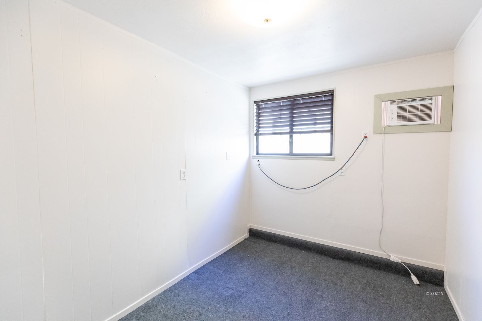 361 North Wildflower Street Ridgecrest, CA 93555 - Photo 29 of 39 a view of an empty room with a window