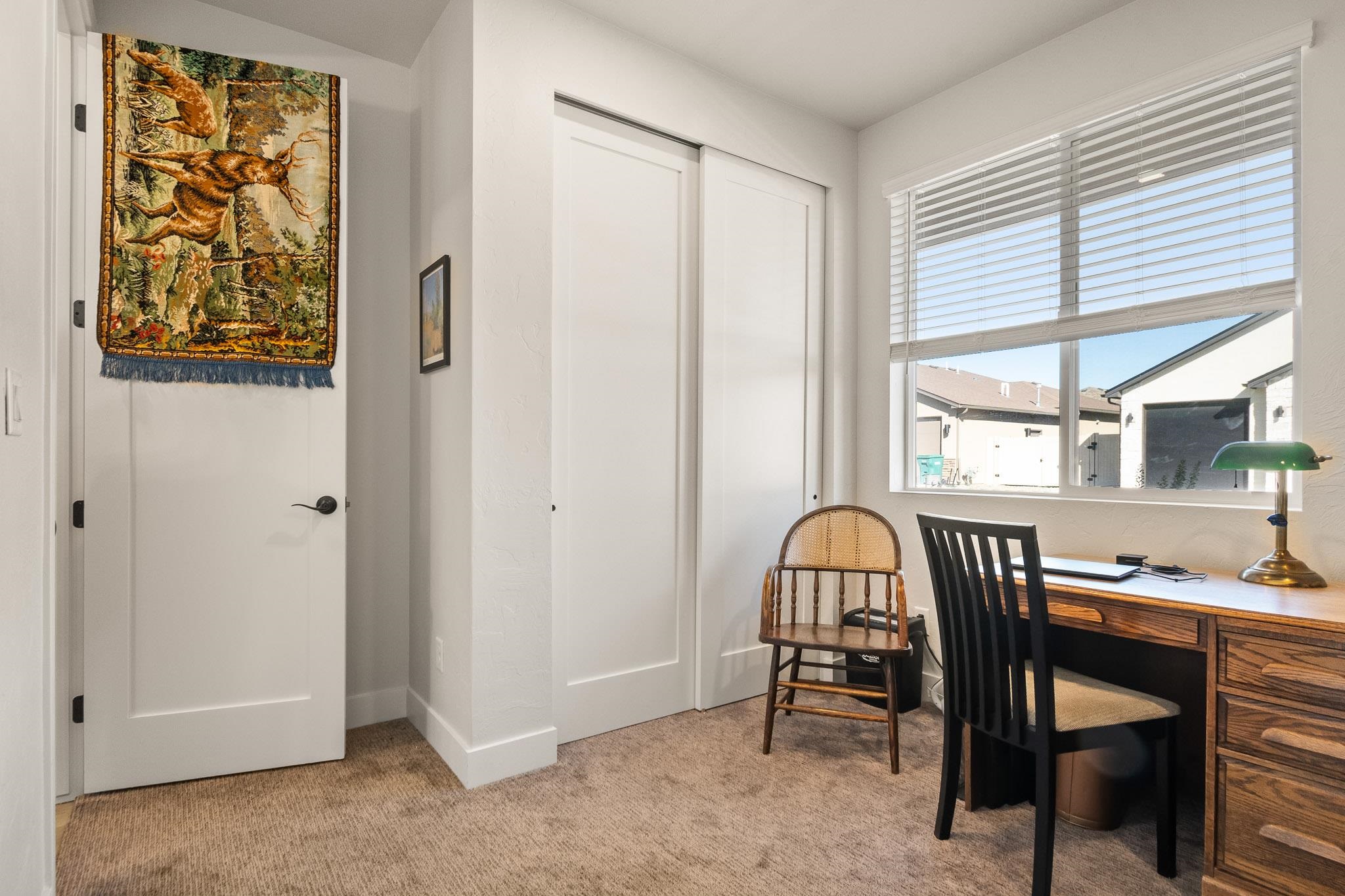 559 Hobbs Court Fruita, CO 81521 - Photo 21 of 40 a view of a workspace with furniture and window