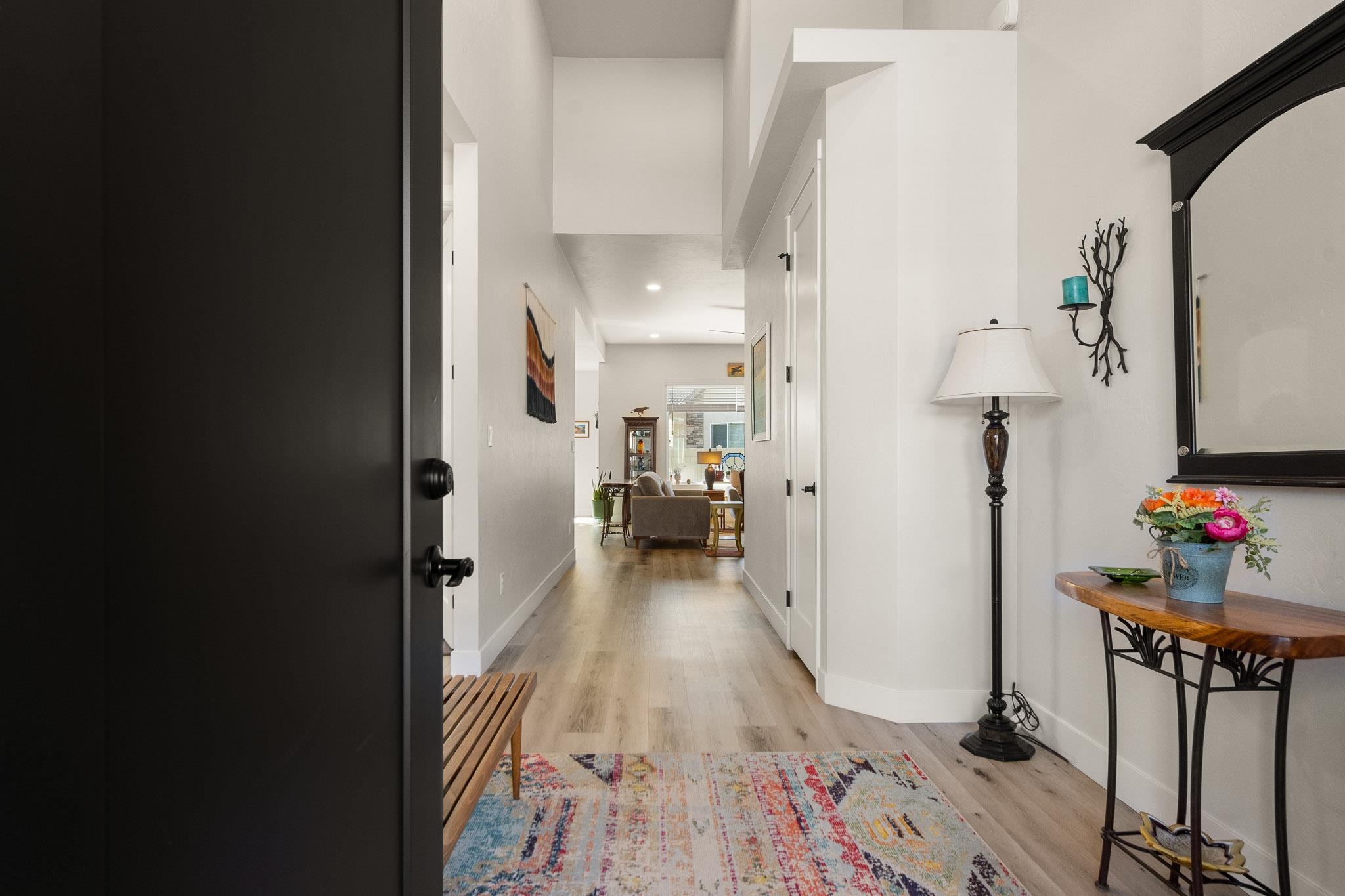 559 Hobbs Court Fruita, CO 81521 - Photo 4 of 40 a view of a hallway view with wooden floor and furniture