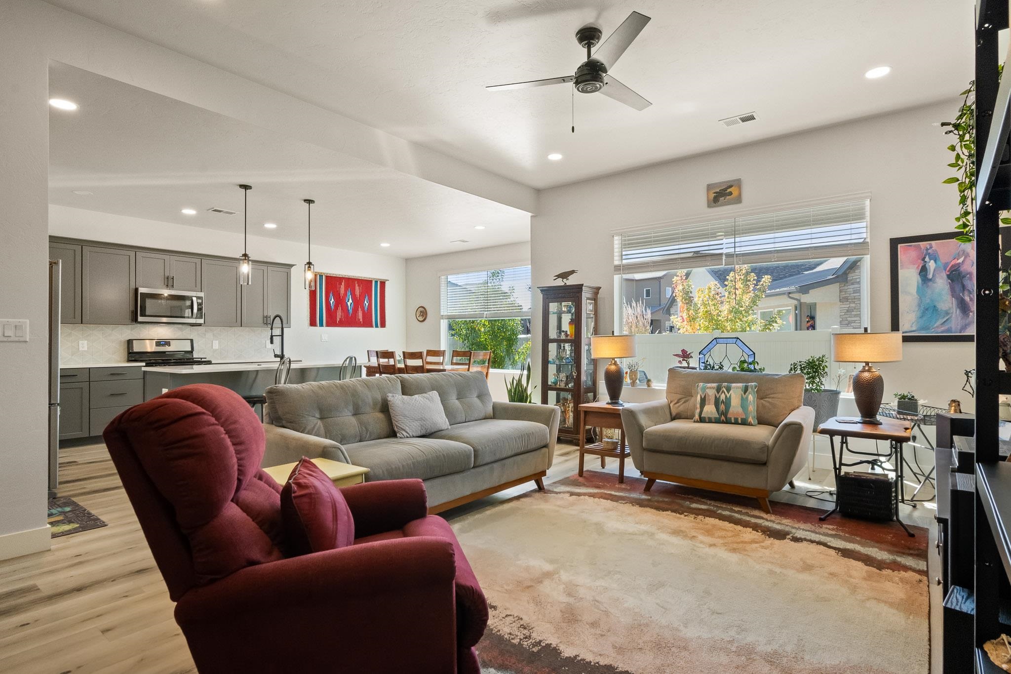 559 Hobbs Court Fruita, CO 81521 - Photo 6 of 40 a living room with furniture kitchen view and a large window