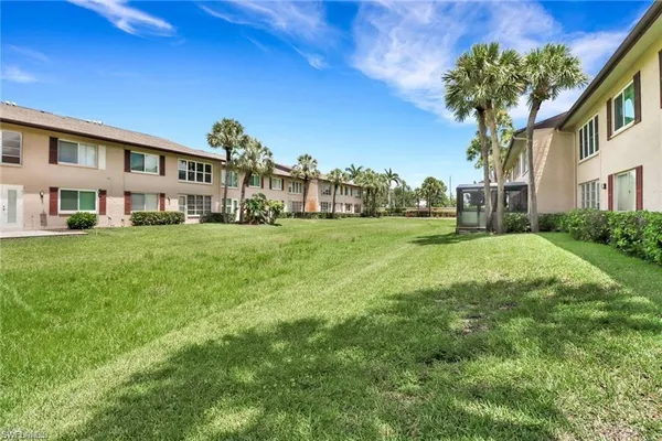 a view of a big yard next to a building