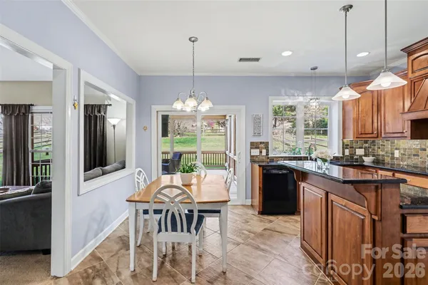 a living room with large windows